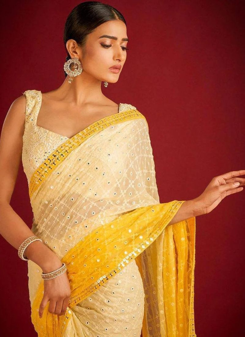 Embroidered Soft Georgette Saree in Off White & Yellow